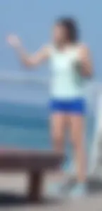 Athletic babe in blue spandex shorts with a nice ass