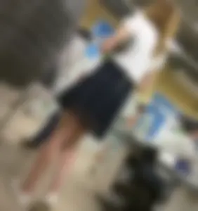 Skinny Girl in a Skirt with Sexy Legs Store Candid