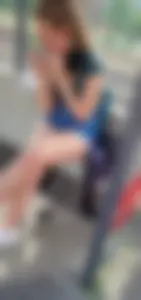 A Cute Candid Girl With Long Gorgeous Legs in Jean Shorts Sitting at the Bus Stop Creepshots