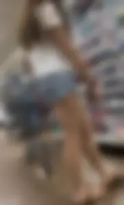 Babe with a  tight ass & long legs in Levi shorts
