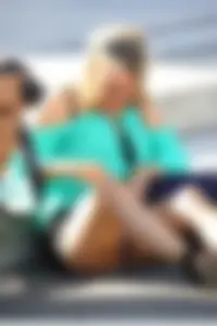 Blonde lady upskirted showing her panties and pussy lips
