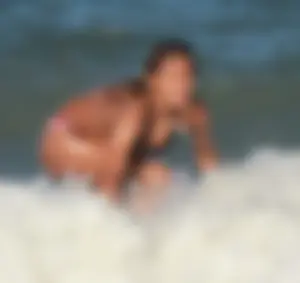 Hot surfer chicks out in the water