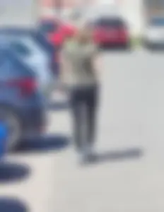 Skinny blonde milf at parking lot