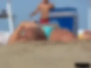 2 topless thonged sexy friends on the beach with great bodies
