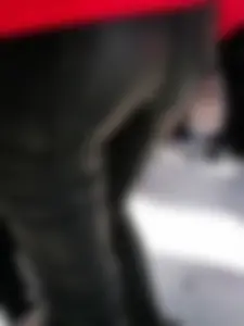 Ass in leather pants closeups on the street