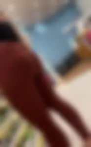 Cute girl in maroon leggings w cleavage