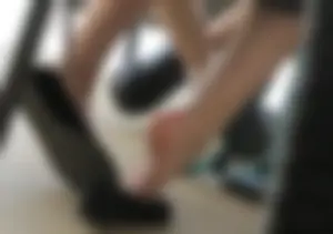 Female Feet With Flats Taken Off Under Table - Photos From College Classroom