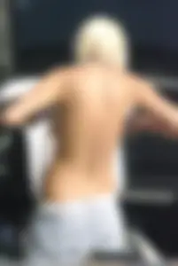 Blonde babe changing into and out of bikini and shows her tits