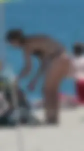 Bunch of sexy babes at the beach in bikinis