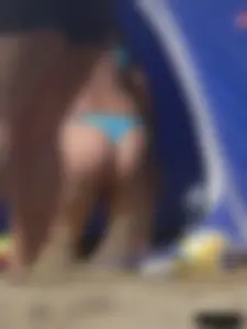 Couple of thick beach teens in little thong bikinis