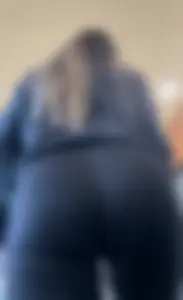 Cute College Girl With Flared Leggings And Glasses