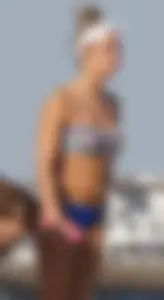 Beach babe in a blue bikini with thick friend in shorts