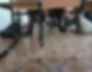 Legs Of College Teen Girls in Black Pantyhose Under Desk
