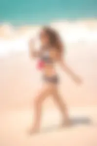 Bunch of sexy girls and milfs in bikinis at the beach
