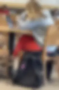 Girl in red leggings at the library