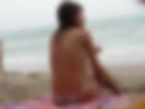 Hot topless girl on the beach in a thong bikini with a nice ass