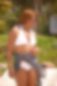 Bunch of sexy girls and milfs in bikinis at the beach
