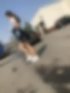 Awesome Candid Girl in a Leather Skirt And Sneakers Walking Down a Street, Then Flashing Her White Panties on the Stairs Creepshots Gallery