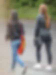 Redhead and ethnic skinny teens in tight jeans