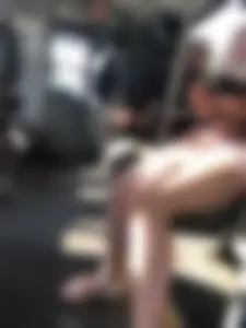 Young Girl in Sandals and Shorts in a Public Bus
