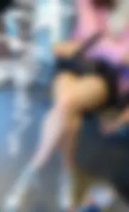 Girl sitting with crossed legs in a public train, hot creepshot