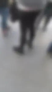 Girl wearing a black skirt over her leggings