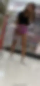 Cute teen in shorts at the store
