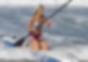 Candid surfer babes on the beach and in bikinis