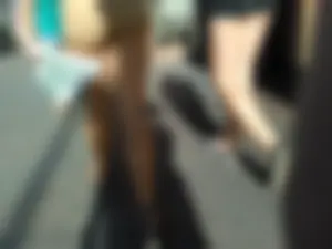Brunette ass cheeks in short yellow shorts