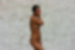 Ula FKK Sexy brunette on a nude beach topless, bottomless and with blue thong