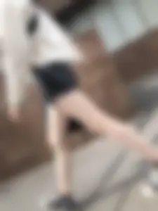 Cute candid teen with pale slim legs in shorts