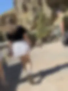 Closeups of a hot girl’s pale legs, she’s wearing a skirt