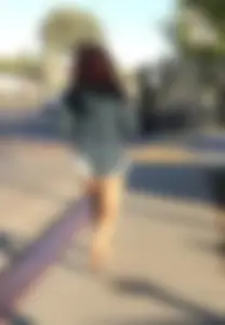 Big boobed redhead walking with no shoes and in shorts