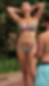 Hot big boobed girl in bikini at the pool