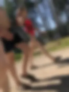 Young Girl in a One-Piece Swimsuit Walking on a Forest Road Photo Gallery