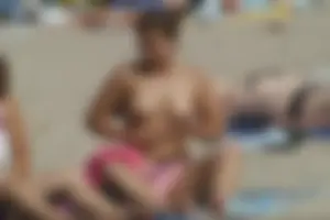 Girls on a nude beach in Sitges, Spain