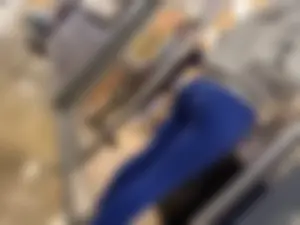 Thick girl waiting in line with blue leggings (OC)