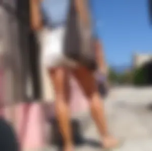 Nice girl in shorts in the morning