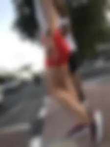 Hot candid chick in tight shorts with amazing hot legs waiting by the crosswalk street creepshot