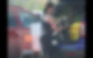 Redhead milf with a nice ass and vtl in leggings while loading her car