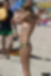 Beach voyeur girls in bikinis, thongs and topless
