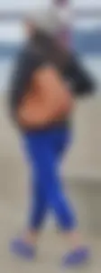 Cute girl with a nice ass in tight blue leggings along the water in San Fran