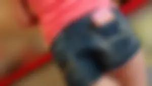 Friend in short shorts showing cheeks and some cleavage