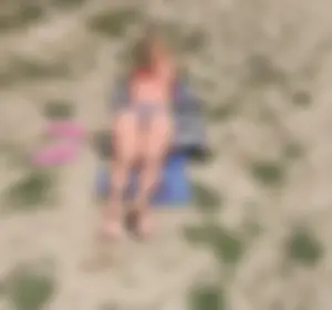 Skinny Candid Blonde in a Swimsuit Lying at a Beach Creepshot - Thin Sexy Legs