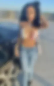 Hot girl in a top and skinny jeans non-candid pics