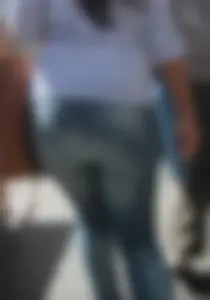 Brunette lady in tight jeans with a little vpl