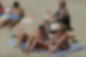Girls on a nude beach in Sitges, Spain