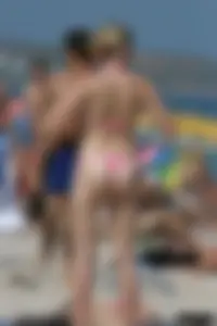 Beach voyeur girls in bikinis, thongs and topless