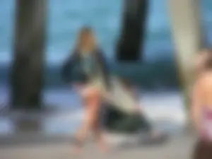 Candid surfers in bikinis
