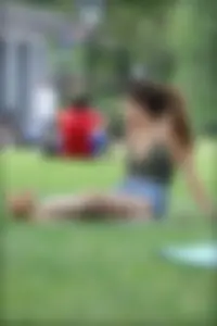 Gymnast or yoga girl in the park in shorts and no bra and even showing some pussy